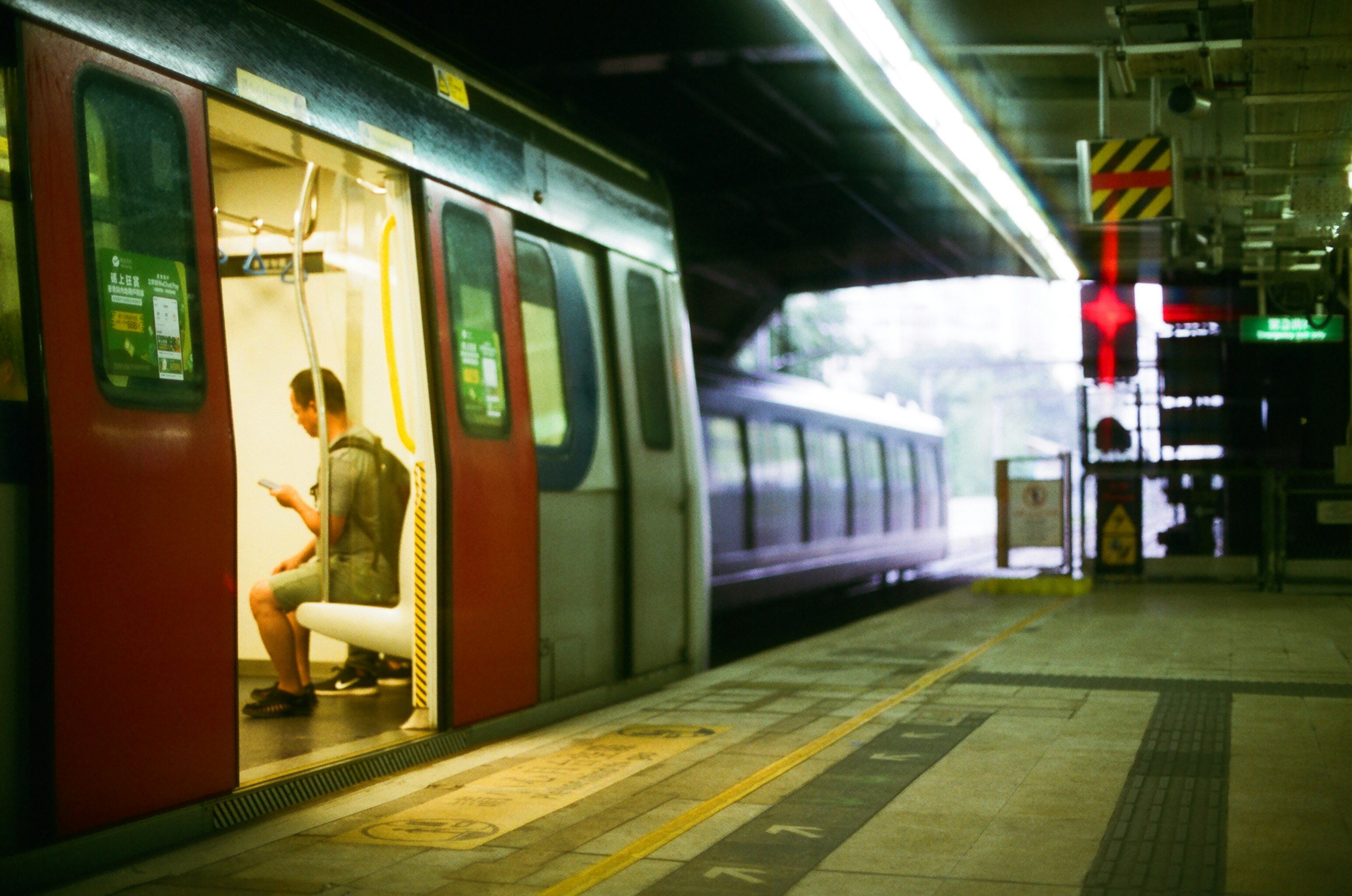 man riding train