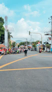 Traffic controllers managing a busy city street during a festival.