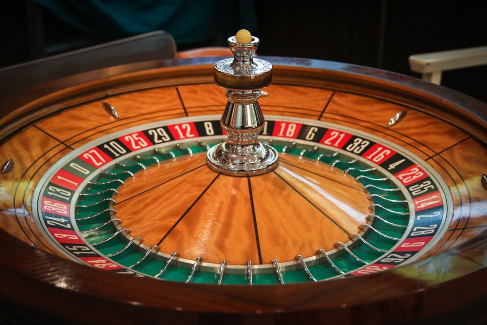 brown, green, and red casino roulette