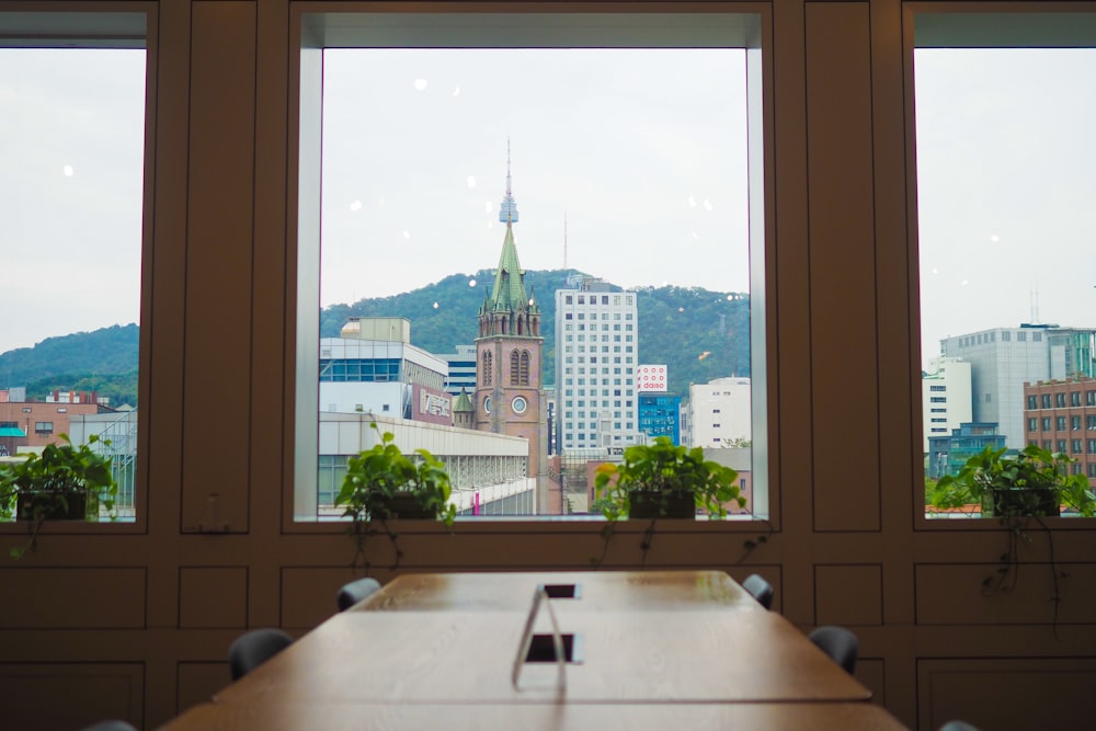 empty dining table near glass window