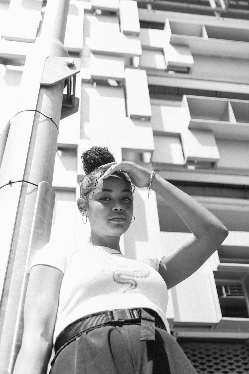 grayscale photo of woman in T-shirt