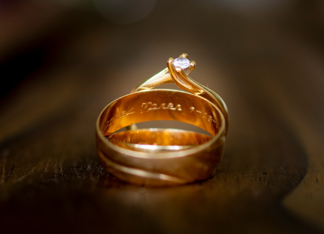 gold-colored ring