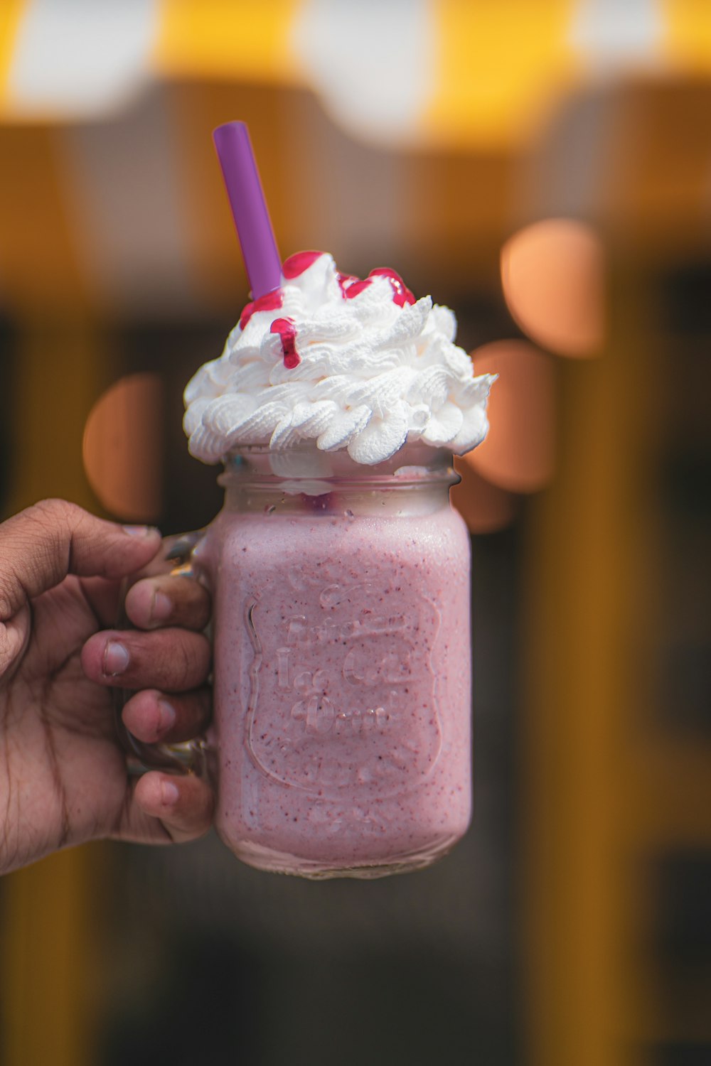 smoothie in jar with cream on top