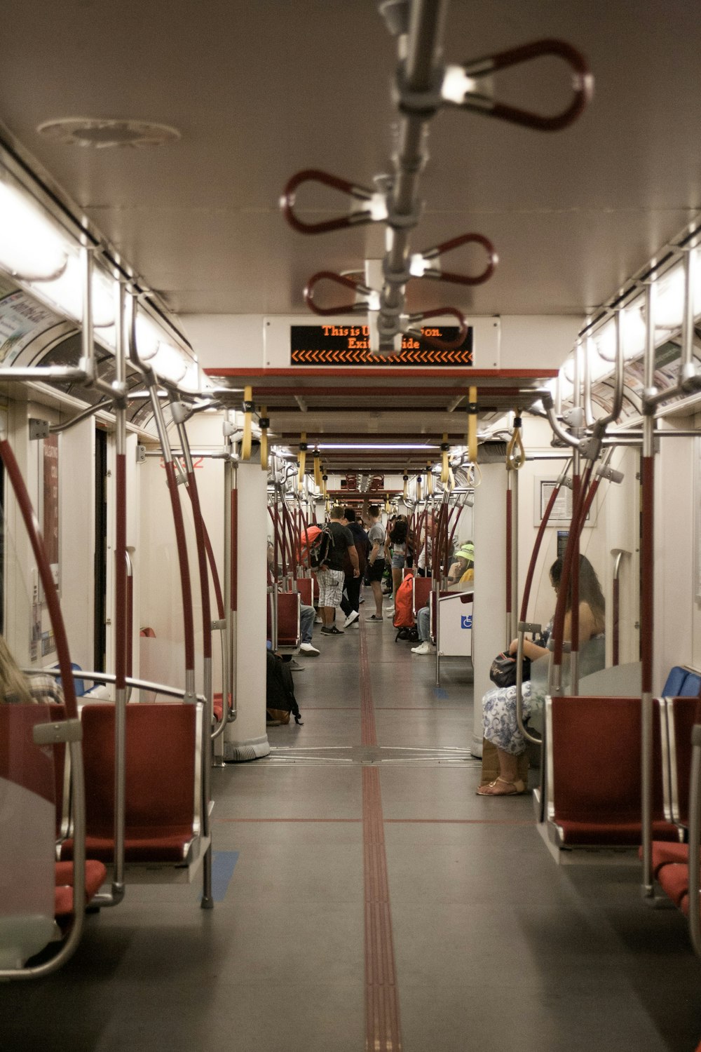 people sitting inside train