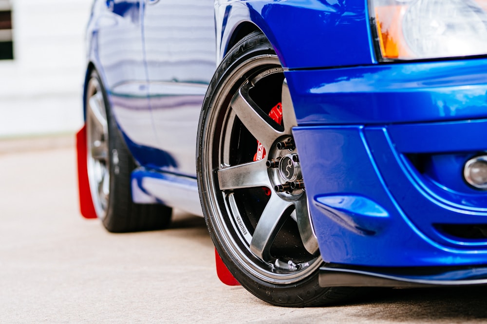 blue car on parked