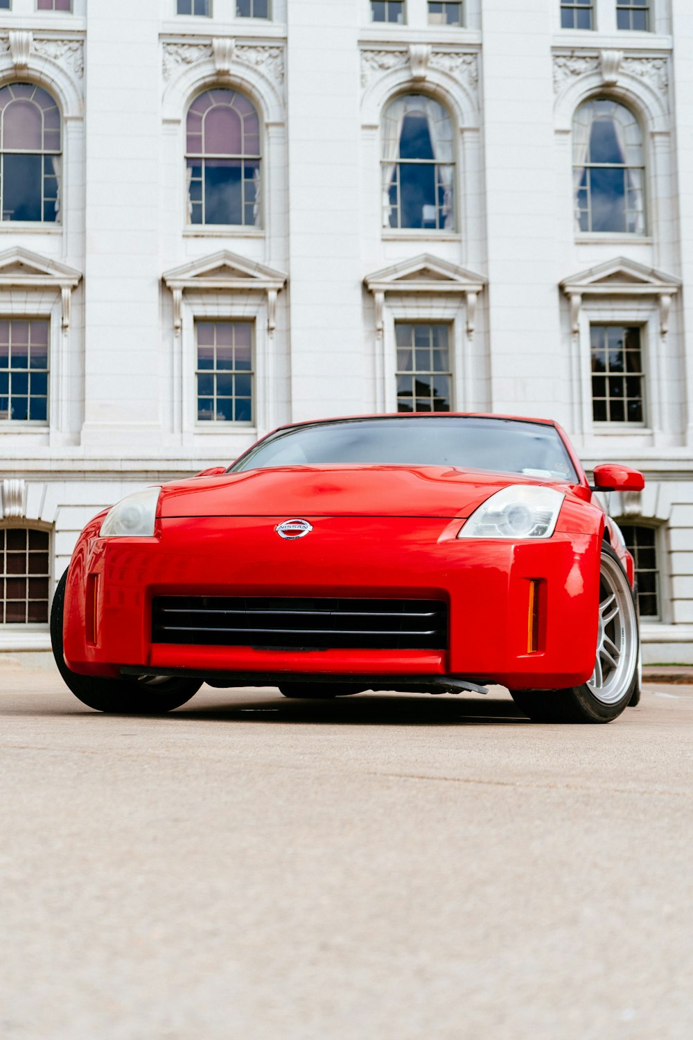 red Nissan vehicle