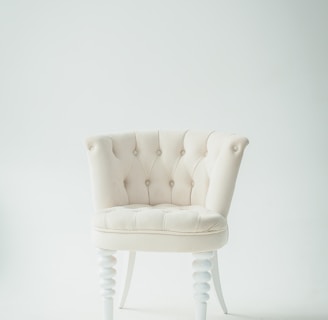 tufted white leather sofa chair