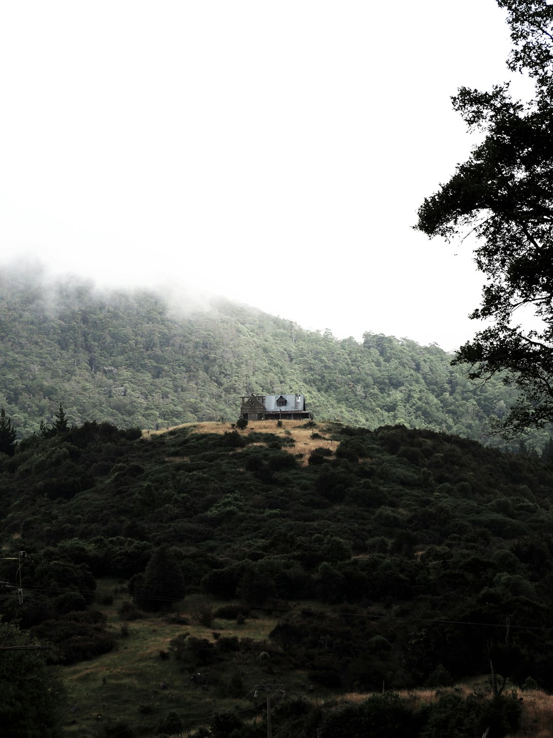 concrete house in a mountain during daytime