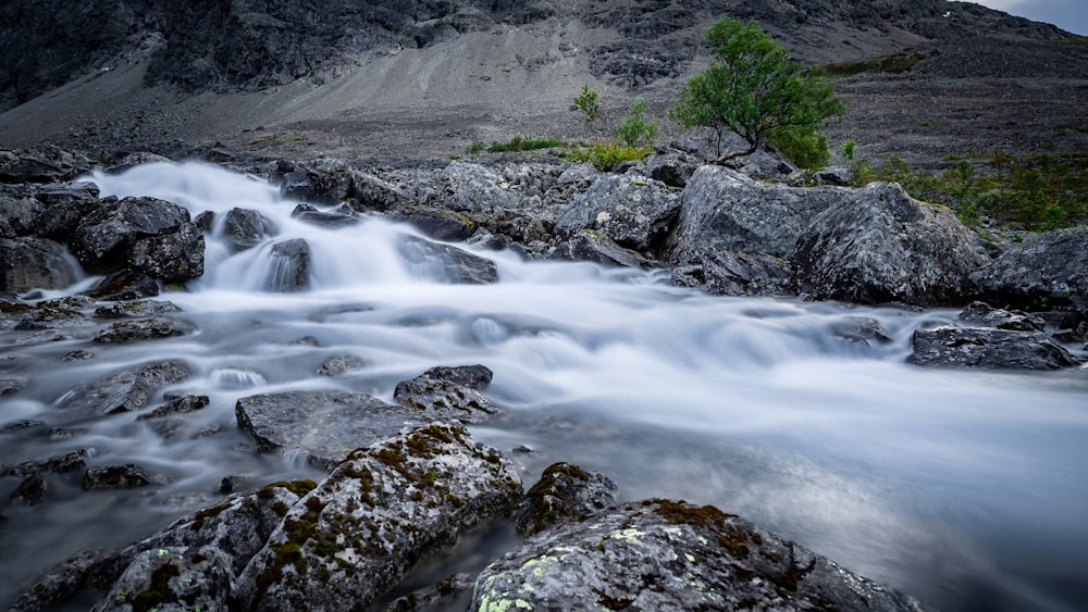 river beside mountain