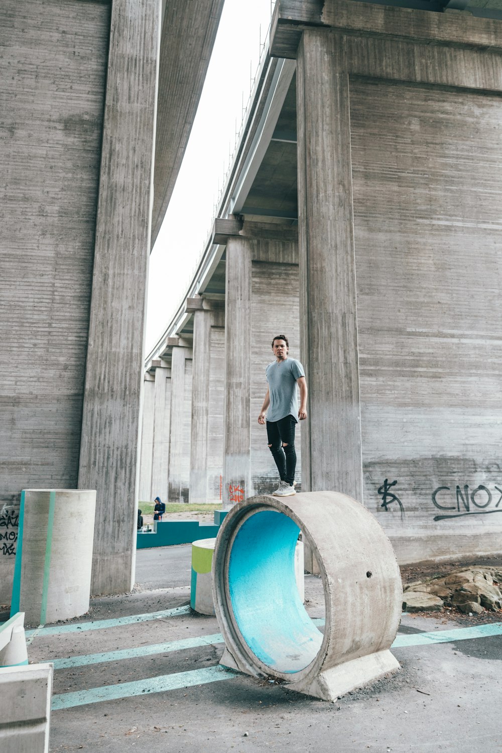 man standing near structure