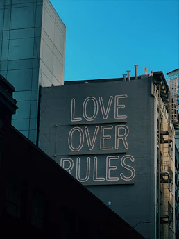 Love Over Rules signage