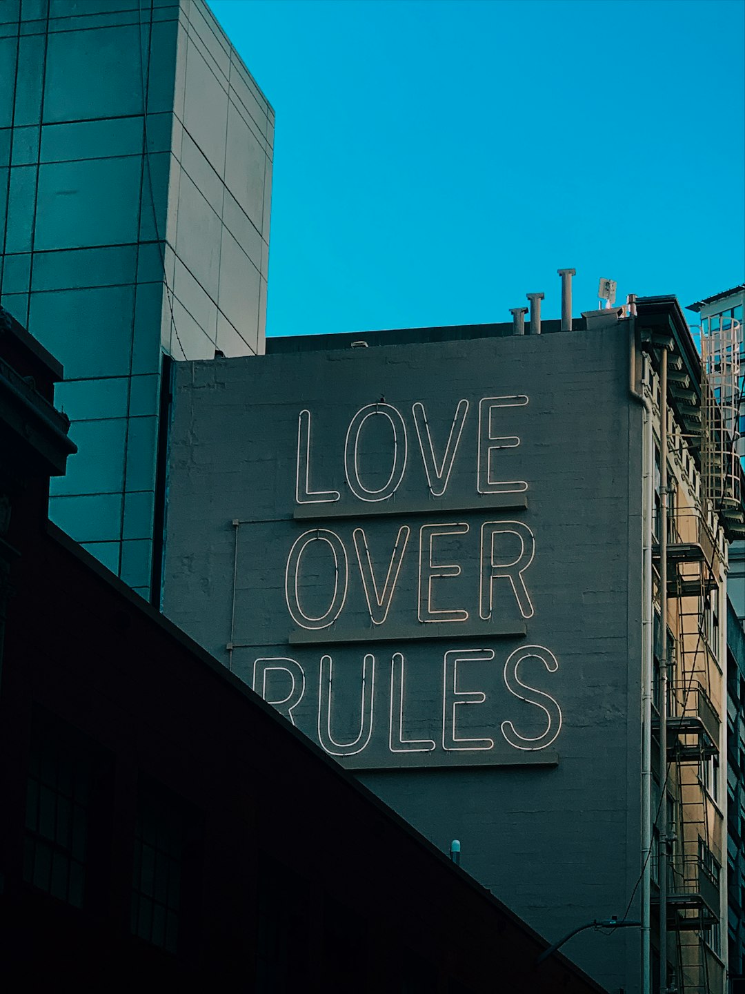 Love Over Rules signage