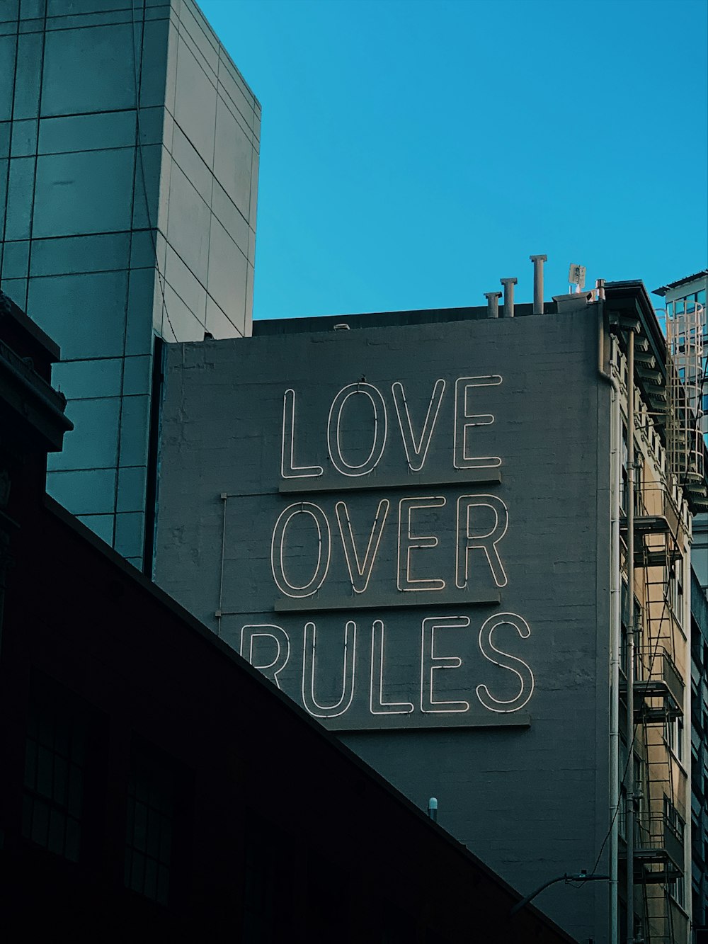 Love Over Rules signage
