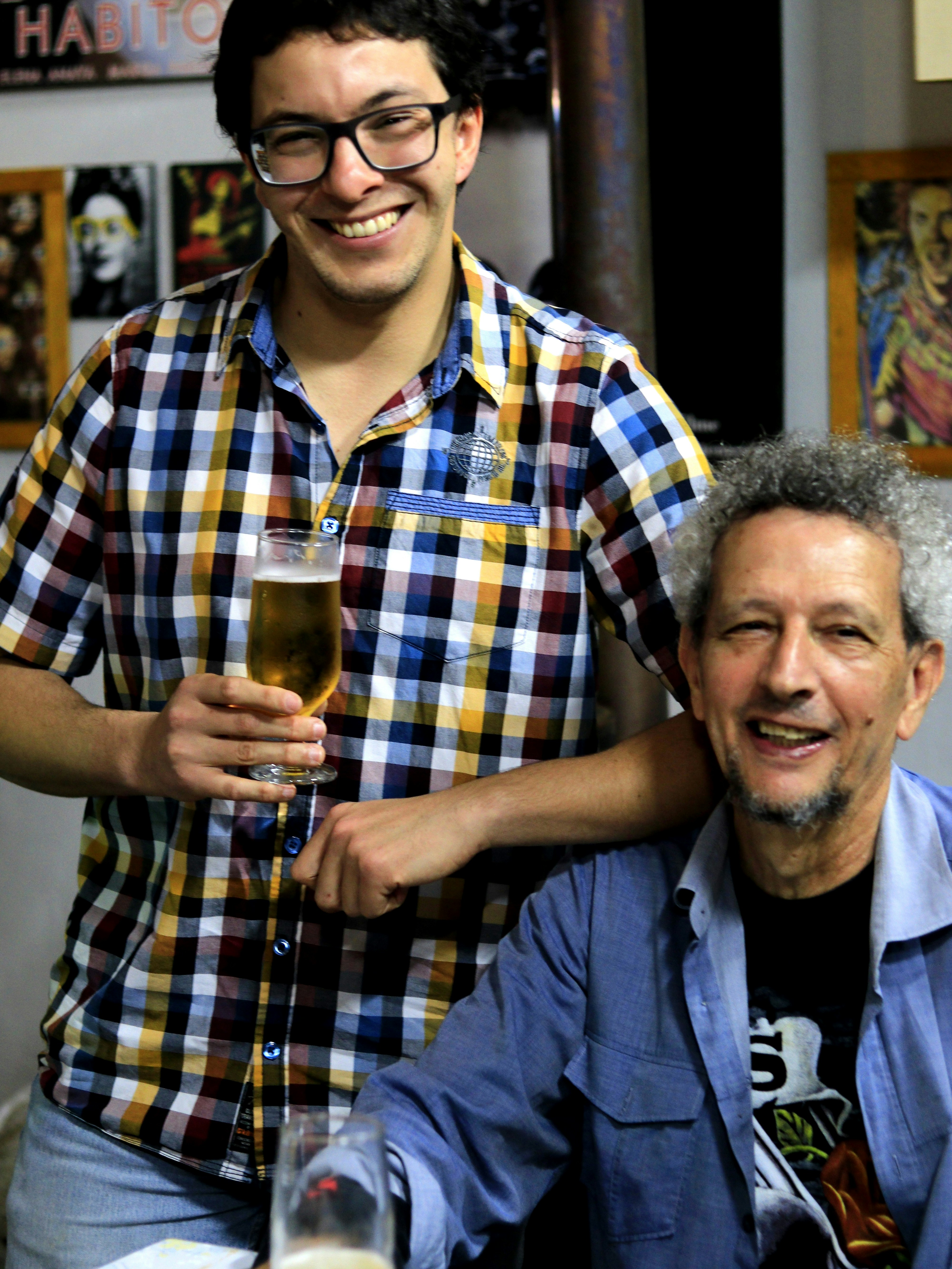 two men driving indoors