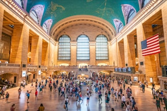 crowd of people walking in Grand Central Terminal