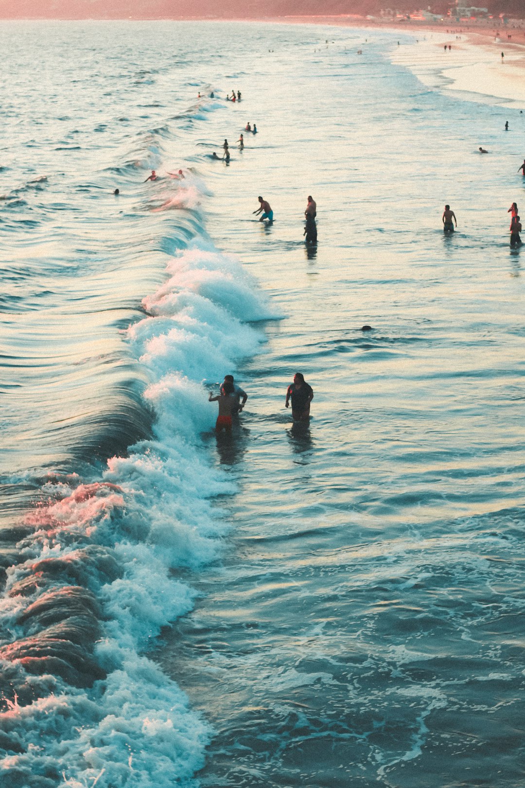 people at the beach during day