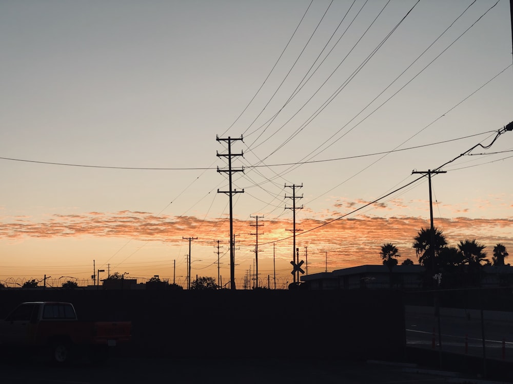 silhouette photography of electric post