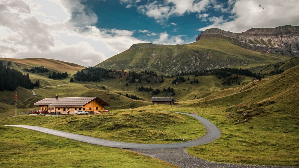 cabin near mountain during daytime