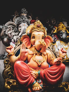 three Lord Ganesha statuettes