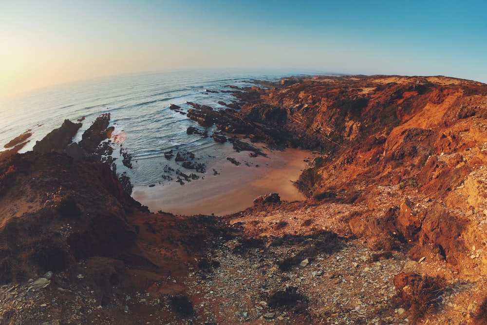 rocky cliffs facing ocean