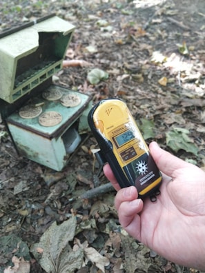 Radiation survey meter displaying readings during a safety check