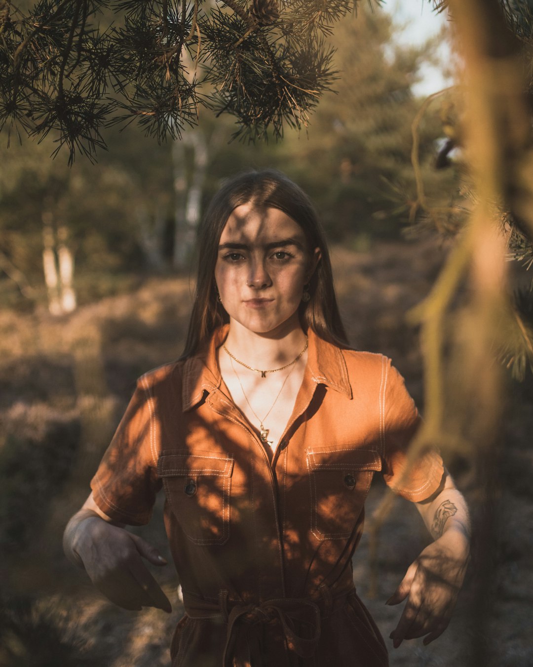 woman wearing brown leather coat