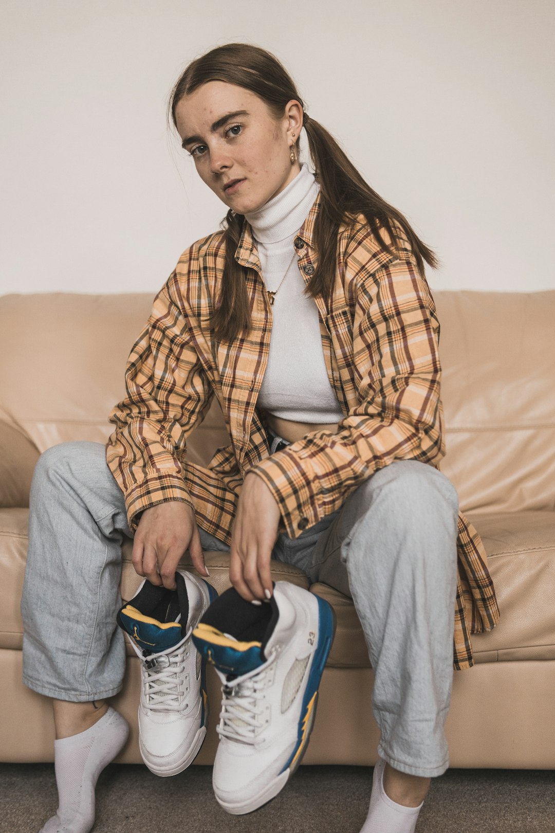 woman sitting on sofa