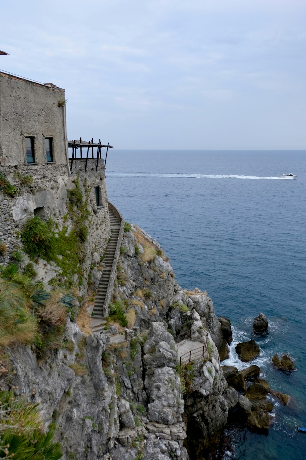 aerial photo of tower beside sea