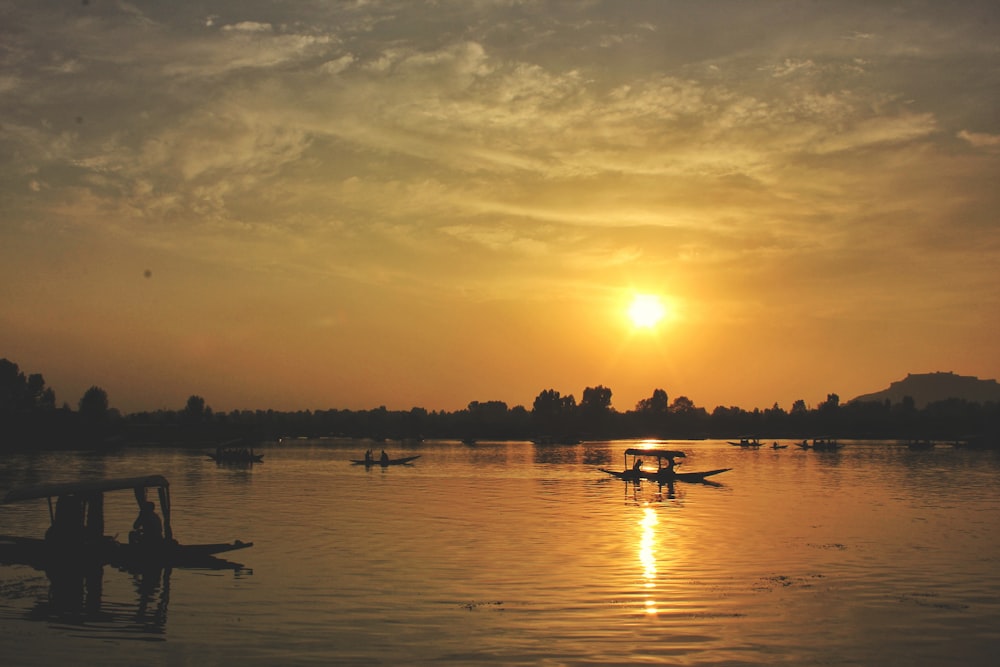 silhouette of person riding on boat