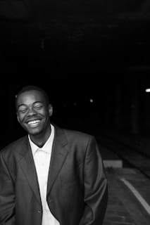 greyscale photography of man