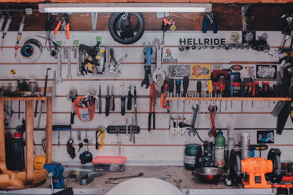mechanical tools on shelf and on wall