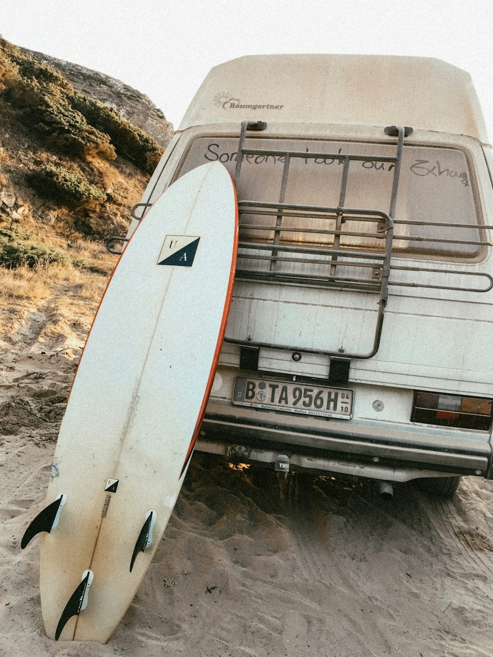 white and black surfboard