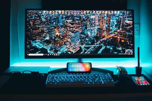 turned-on flat screen television