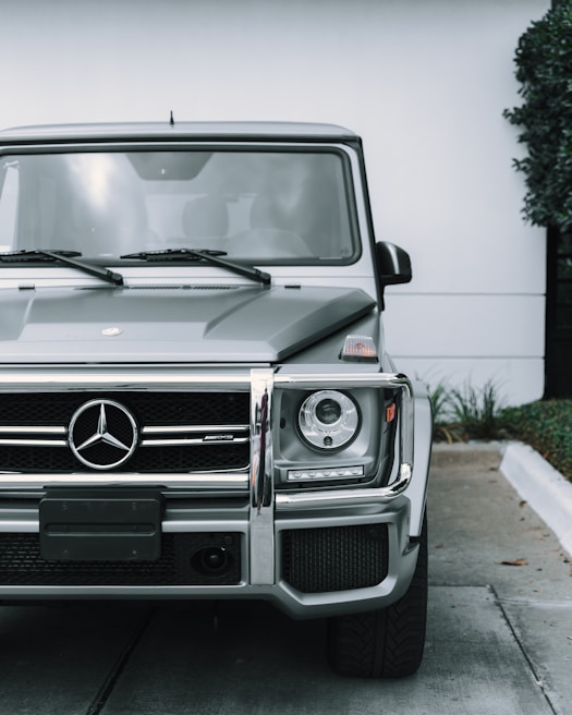 parked silver Mercedes-Benz vehicle