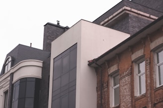 A portfolio showcasing finished construction projects, with diverse architectural designs.