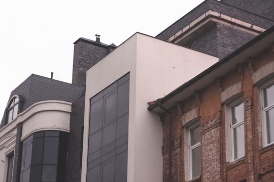 A collage of various architectural designs, including homes and urban spaces.