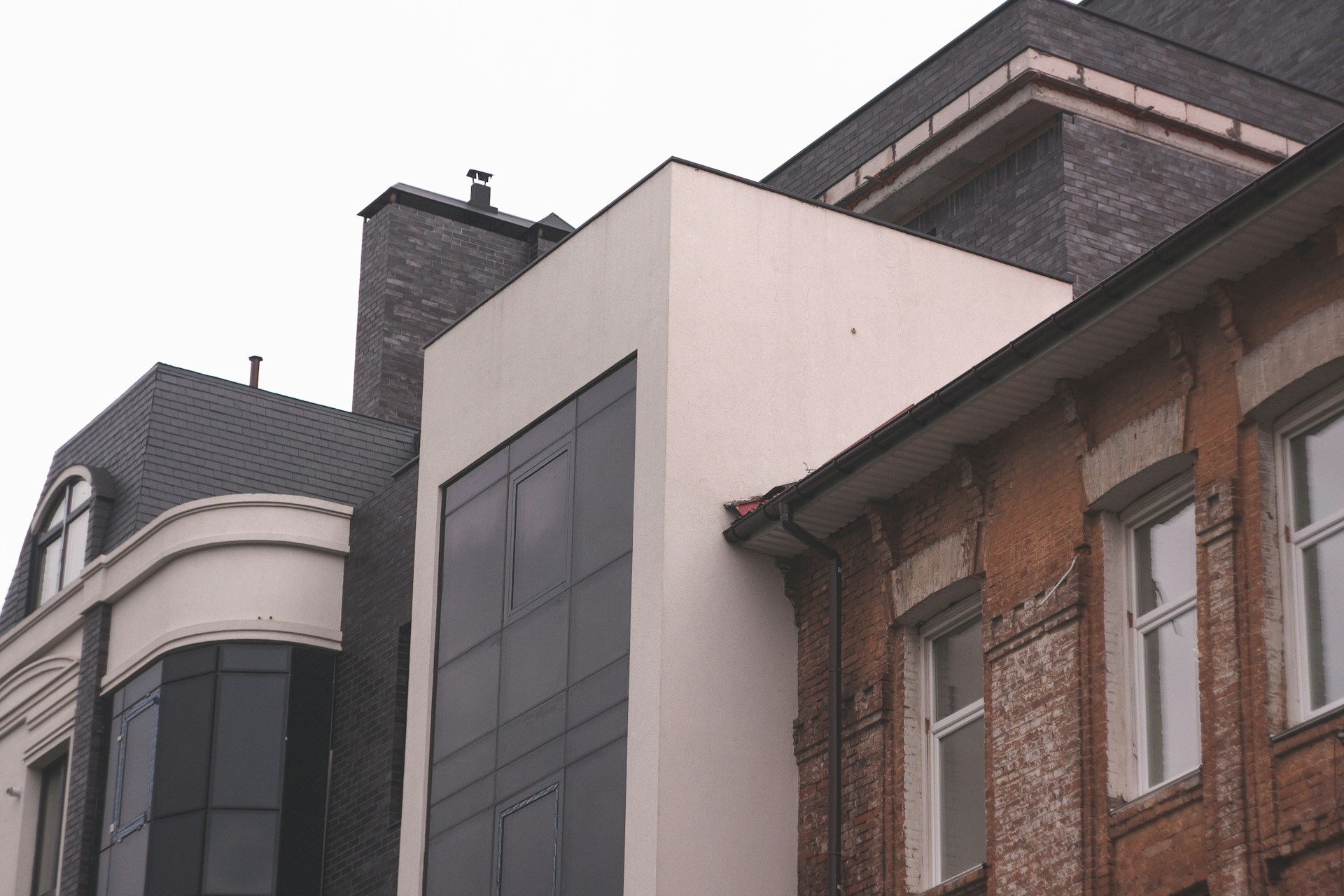 woman wearing yellow long-sleeved dress under white clouds and blue sky during daytime