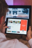 turned-on black tablet computer