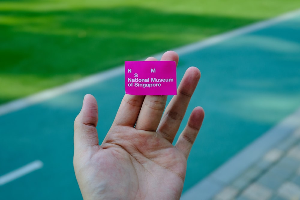 pink card on hand