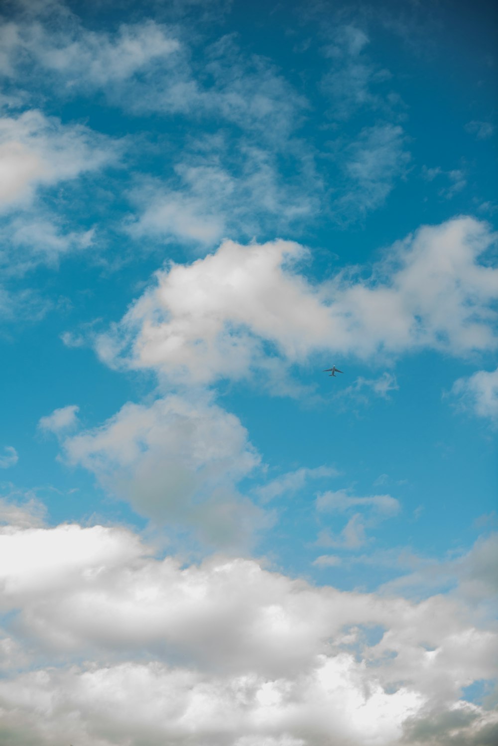 white and blue cloudy skies during daytime