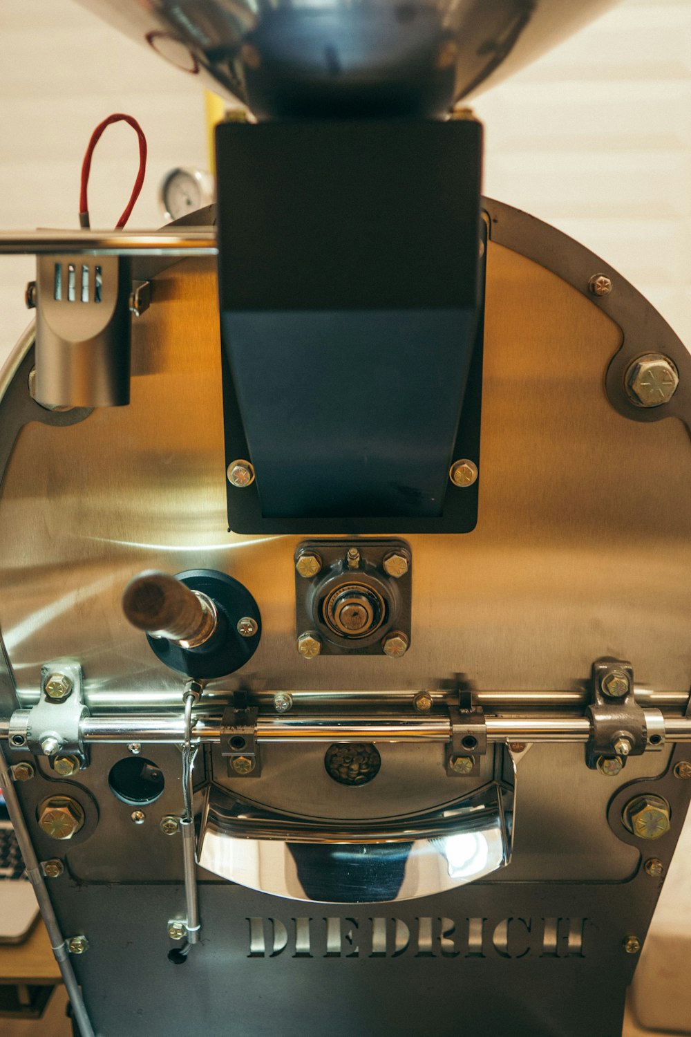 a close up of a machine with a metal object on top of it