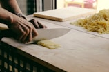 person chopping dough