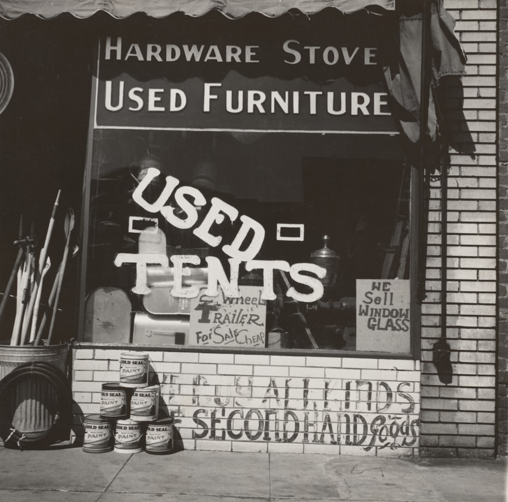 grayscale photo of store front