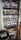 An electrical switchgear panel with multiple circuit breakers and wiring is organized within a metal frame. Colored wires are neatly attached, and labels or indicators can be seen on some components. The environment suggests an industrial or technical setting.