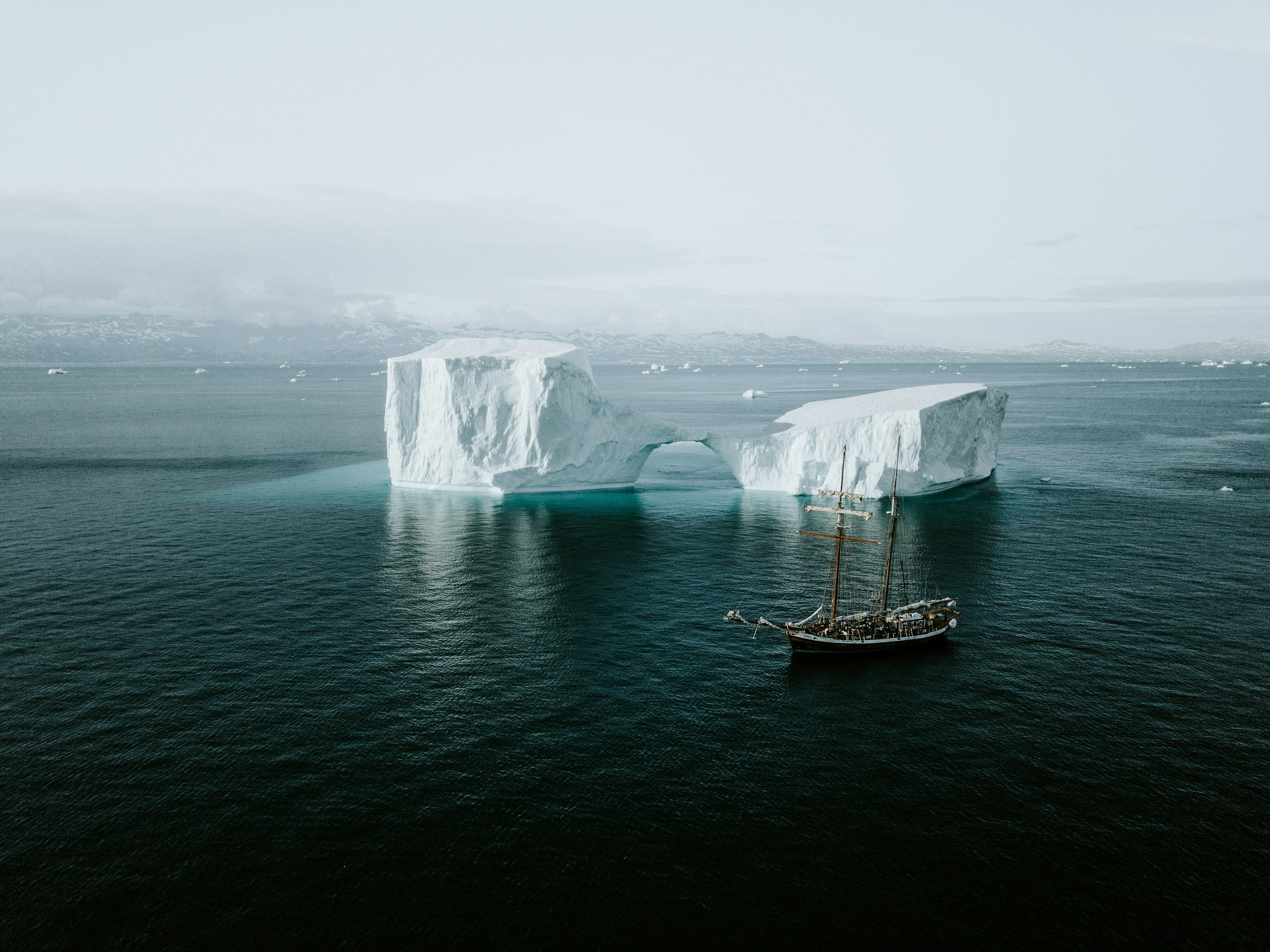 boat navigating the icebergs