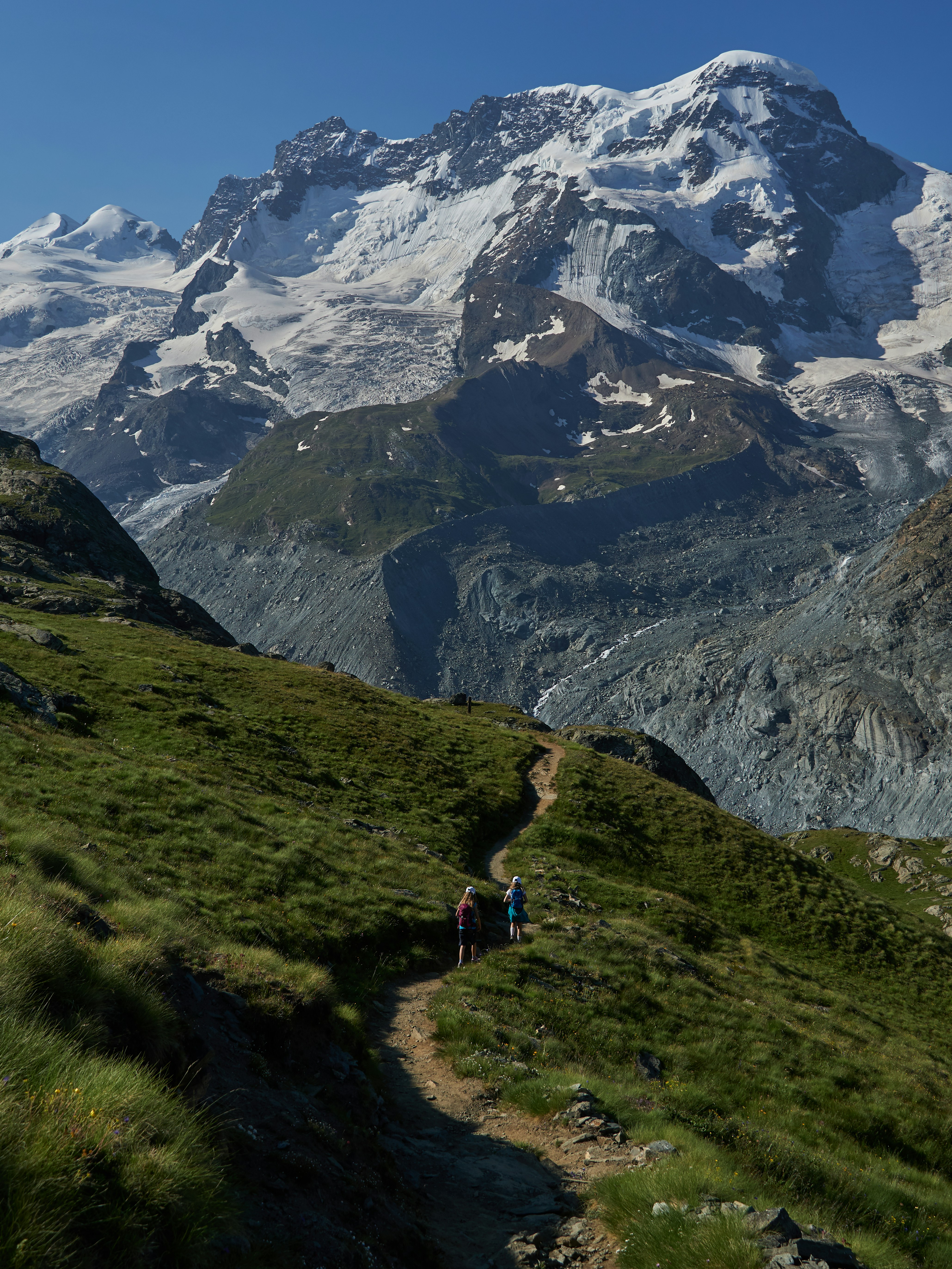 people walking on mountain