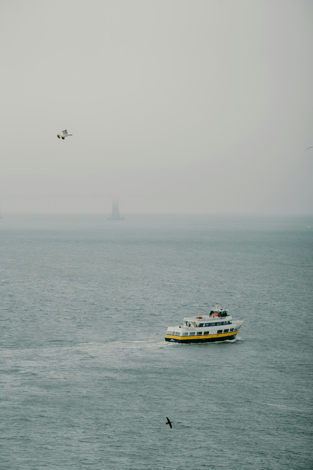 white and yellow ship