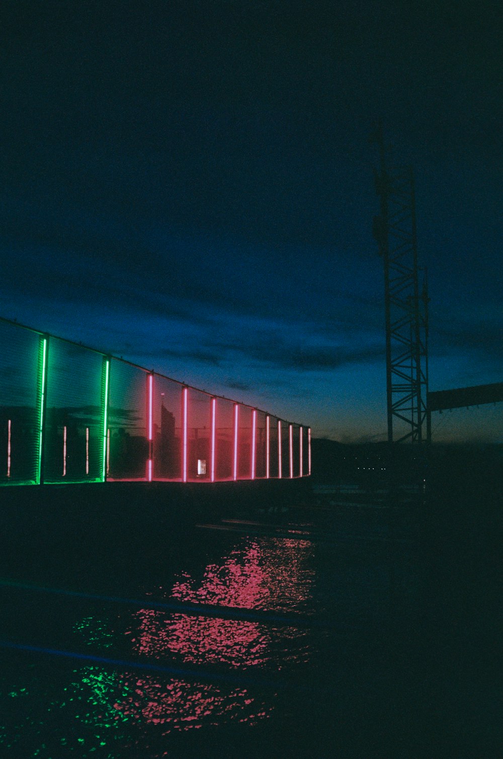 a row of lights that are on the side of a building