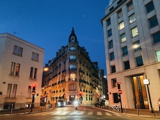 A detailed digital sketch of a quiet urban street corner at dusk, showing intricate architectural lines and soft shadows.