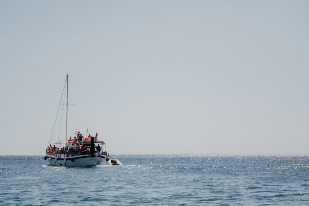 Boat with passengers at sea